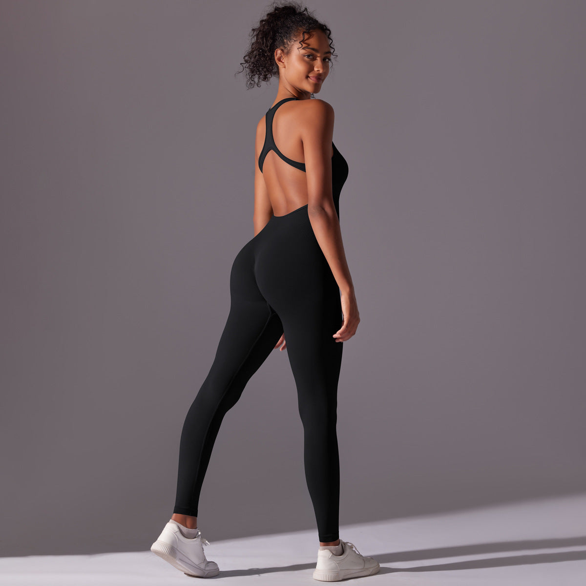 Damen Sportlicher Jumpsuit mit offener Rückenpartie und hoher Flexibilität WW
