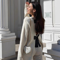 Damen Strickjacke mit dekorativen Schleifen und angeschnittenem Design WW