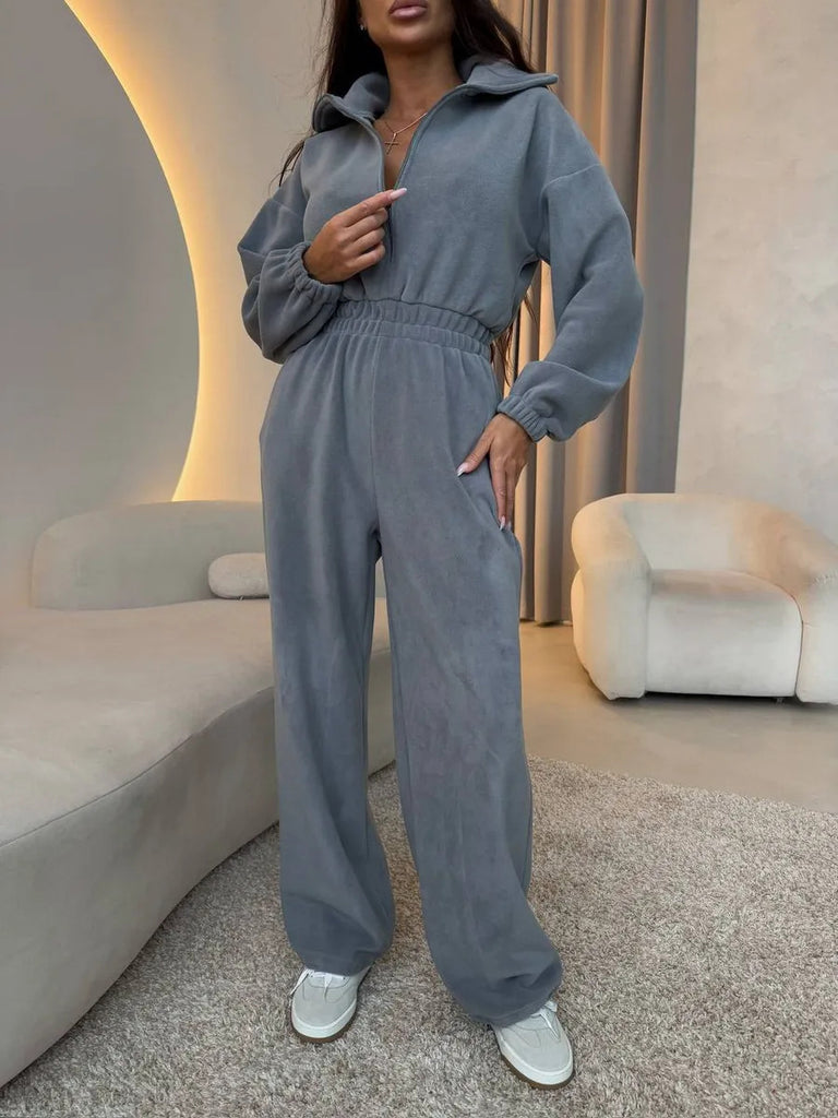 Damen eleganter Jumpsuit mit kurzem Reißverschluss und elastischem Bund WW
