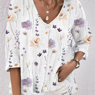 Damen Bluse mit floralem Druck und modernem Knopfdesign WW