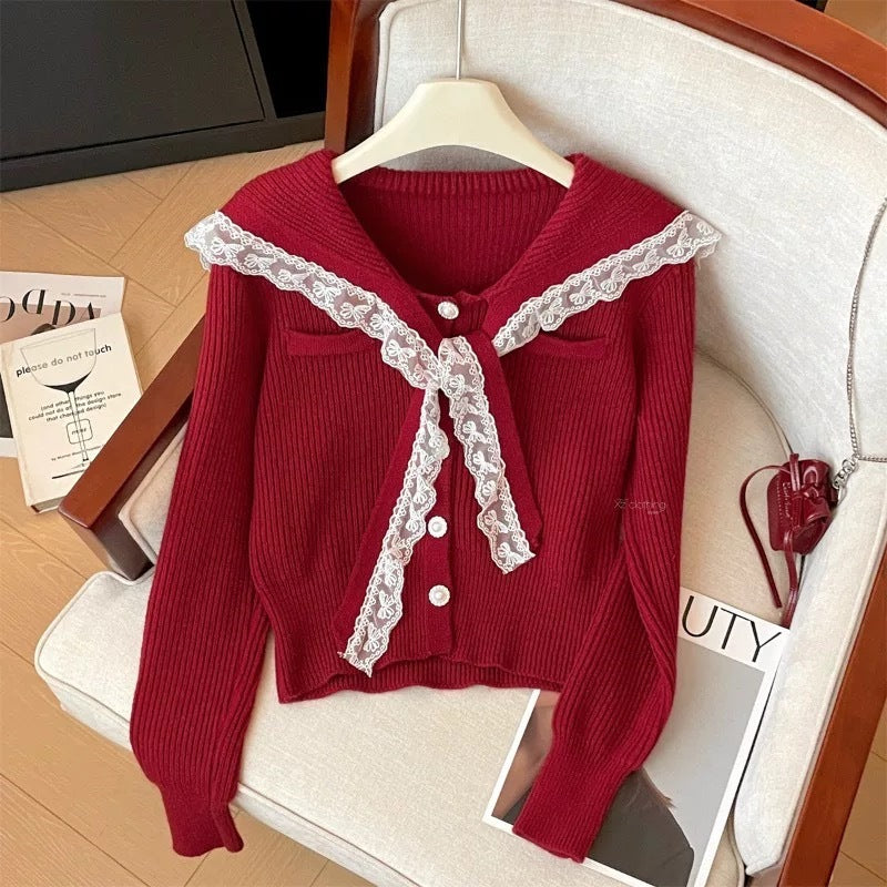 Damen Strickjacke mit Rüschen-Halsband und dekorativen Knöpfen WW