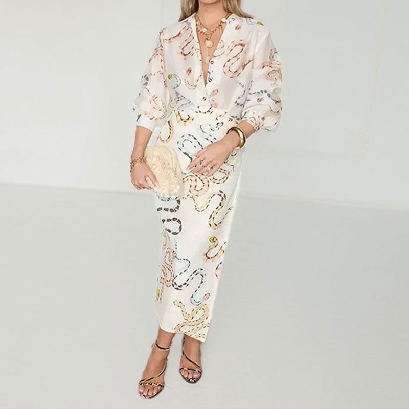 Damen Midikleid mit schickem Schlangenmuster und transparenten Ärmeln W&W Mode