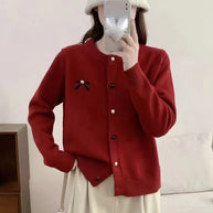 Damen Strickjacke mit dekorativer Schleifenstickerei WW