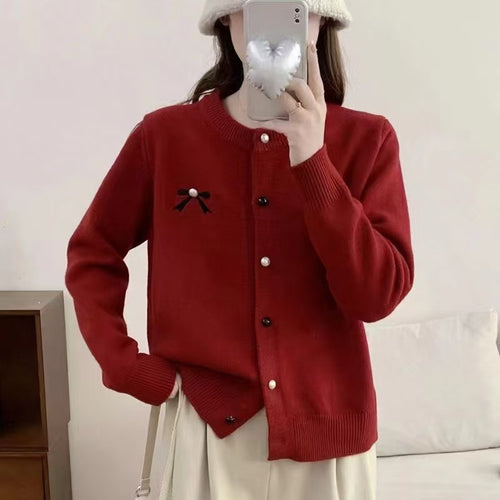 Damen Strickjacke mit dekorativer Schleifenstickerei WW