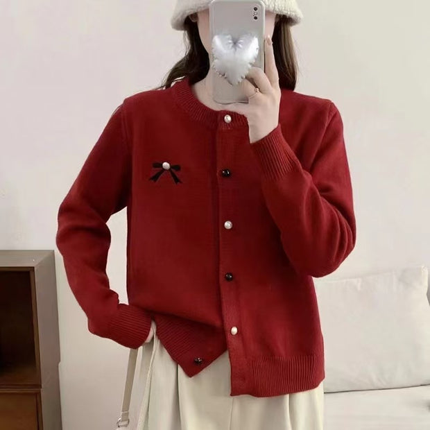 Damen Strickjacke mit dekorativer Schleifenstickerei WW