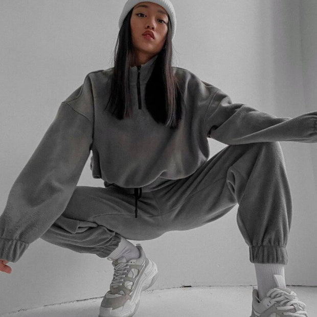 Damen bequeme Fleece-Loungejacke mit verkürztem Reißverschluss und elastischem Bund WW