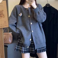 Damen Strickjacke mit raffinierten Zopfdetails und Knopfverschluss WW