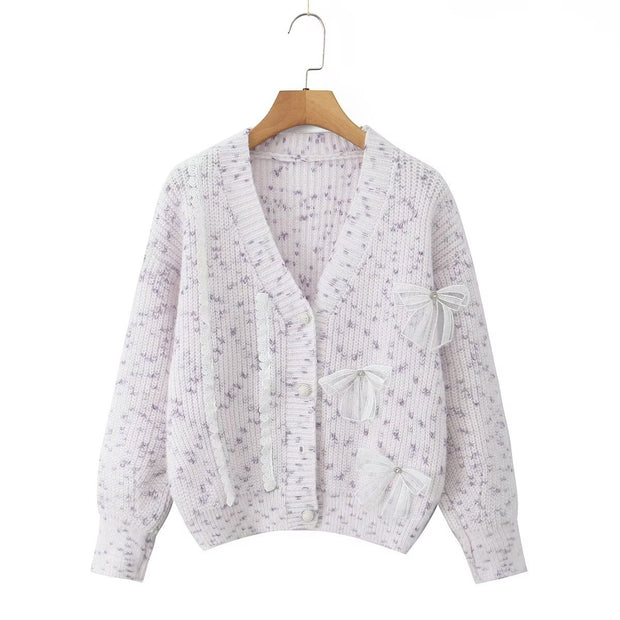 Damen Strickjacke mit dekorativen Schleifen und zartem Muster WW