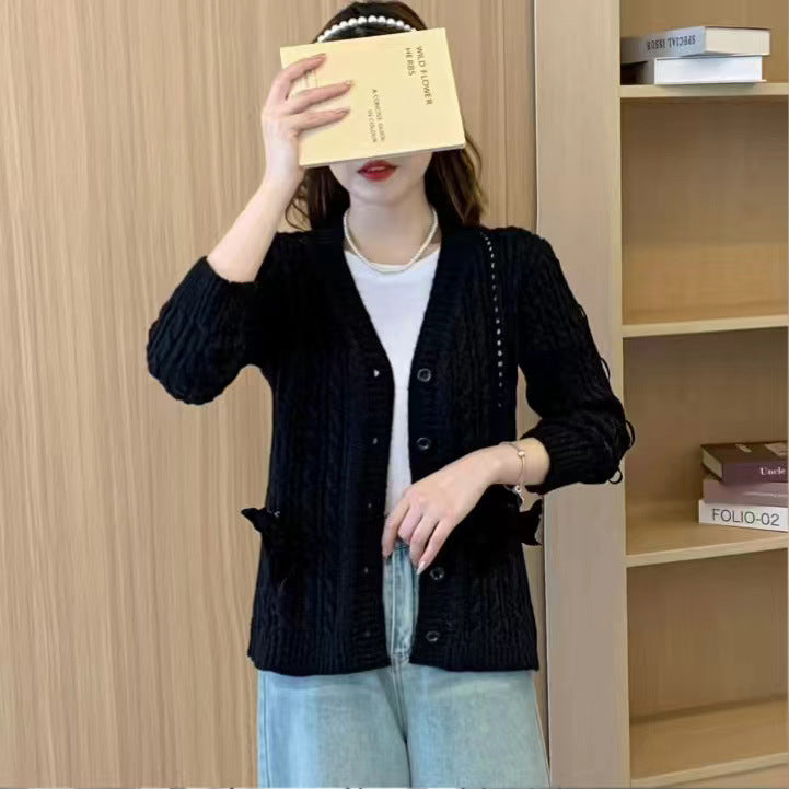 Damen Strickjacke mit dekorativen Taschen und Wellenmuster WW