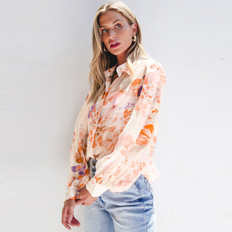 Damen luftiges Blusenshirt mit floralem Design und voluminösen Ärmeln WW