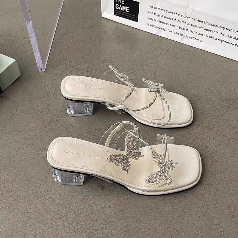 Damen Glamouröse Sandaletten mit funkelnden Schmetterlings-Applikationen und transparenter Sohle WW