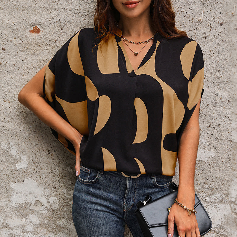 Damen Bluse im modernen abstrakten Design mit V-Ausschnitt und kurzen Ärmeln WW