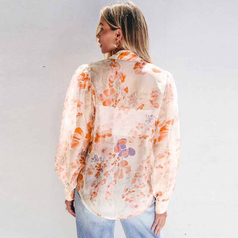 Damen luftiges Blusenshirt mit floralem Design und voluminösen Ärmeln WW