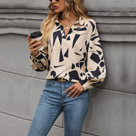 Damen Bluse mit auffälligem grafischem Design und voluminösen Ärmeln WW