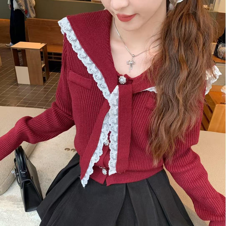 Damen Strickjacke mit Rüschen-Halsband und dekorativen Knöpfen WW