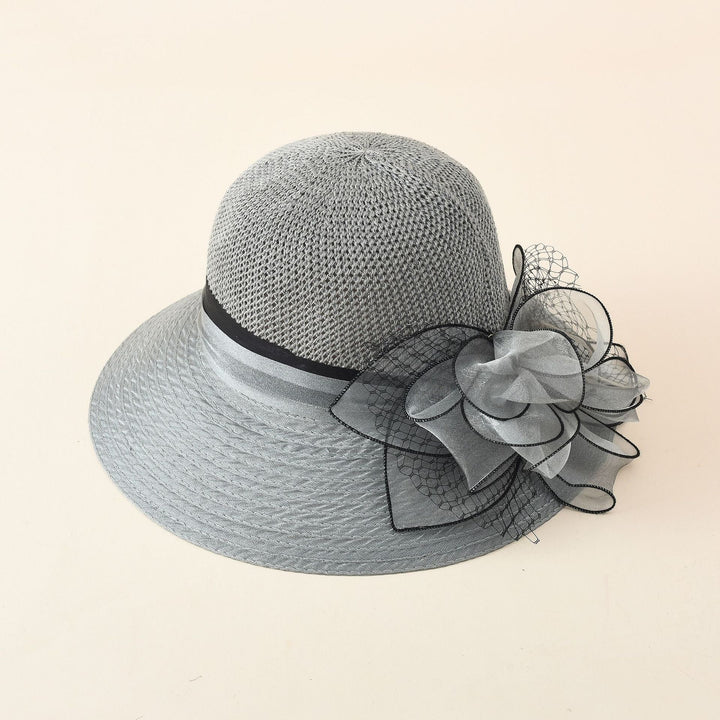 Damen eleganter Sonnenhut mit feiner Schleifenverzierung und breiter Krempe W&W Mode