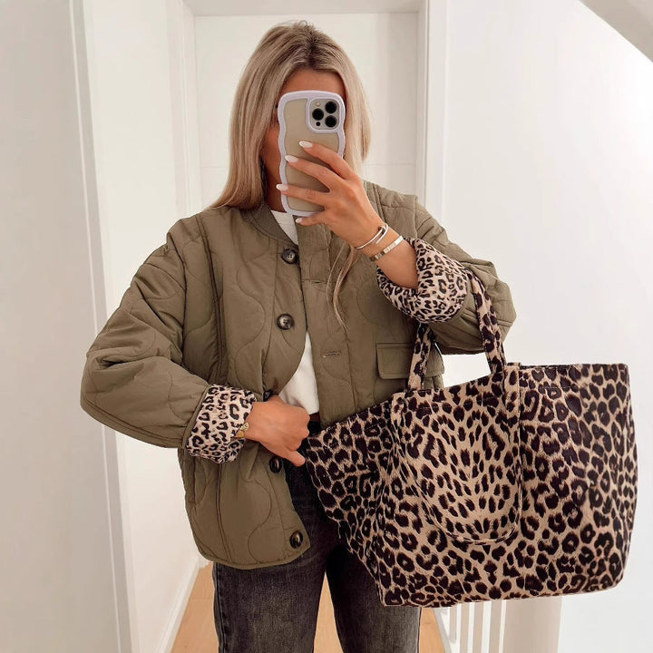 Damen Steppjacke im eleganten Design mit praktischem Knopfverschluss und seitlichen Taschen W&W Mode
