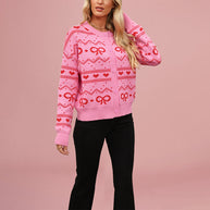 Damen Strickjacke mit verspieltem Herz- und Schleifenmuster WW
