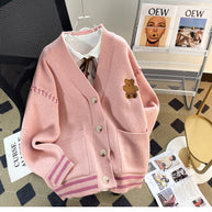 Damen Strickjacke mit einzigartiger Bärenapplikation und modernen Details WW