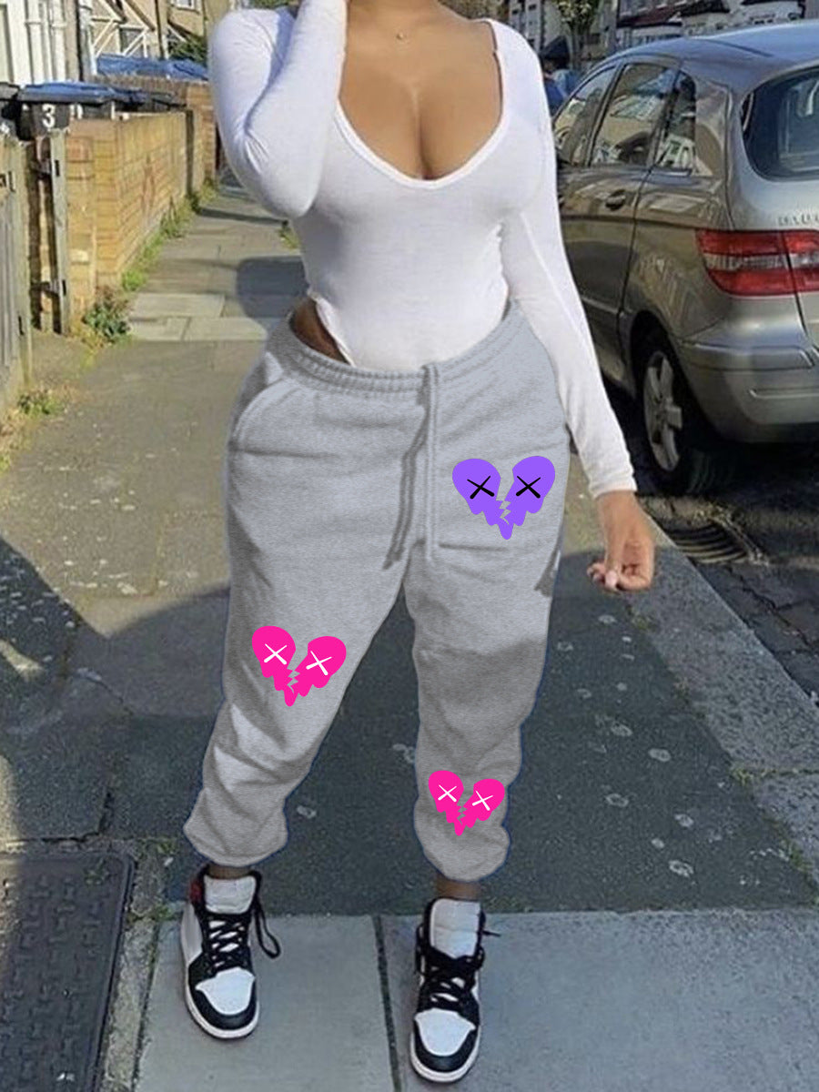 Damen Bequeme Sweatpants mit kreativen Herzmotiven WW