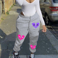 Damen Bequeme Sweatpants mit kreativen Herzmotiven WW