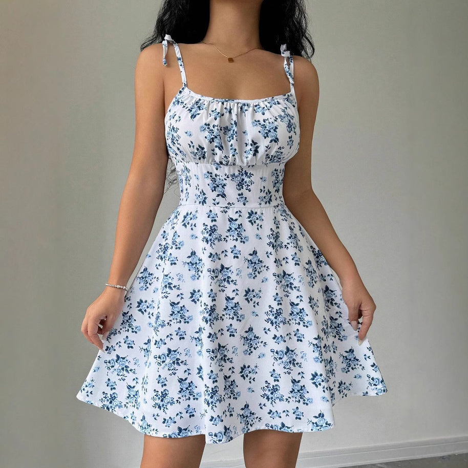 Damen Sommerkleid mit verstellbaren Spaghetti-Trägern und floralen Akzenten W&W