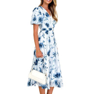 Damen Midikleid mit tailliertem Schnitt, voluminösen Ärmeln und elegantem Wellenmuster WW