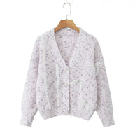 Damen Strickjacke mit dekorativen Schleifen und zartem Muster WW