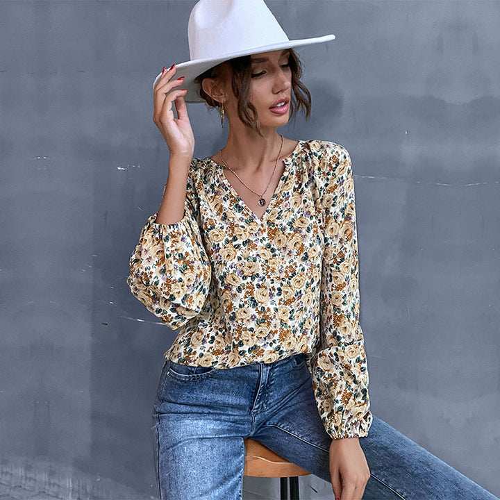 Damen Bluse mit floralem Design und eleganten Puffärmeln W&W Mode