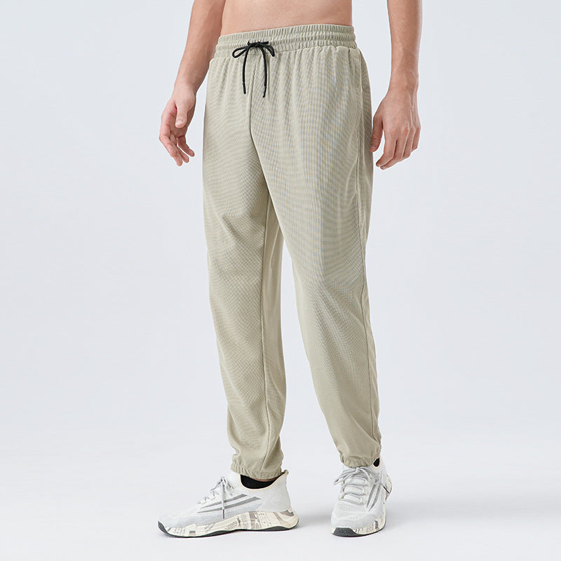 Herren Sportliche Laufhose mit atmungsaktiven Netzstrukturen und verstellbarem Bund WW