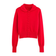 Damen Strickjacke mit Rüschenkragen und dekorativen Knöpfen WW