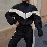 Damen sportlicher Funktionsanzug mit hohem Kragen und elastischen Bündchen WW