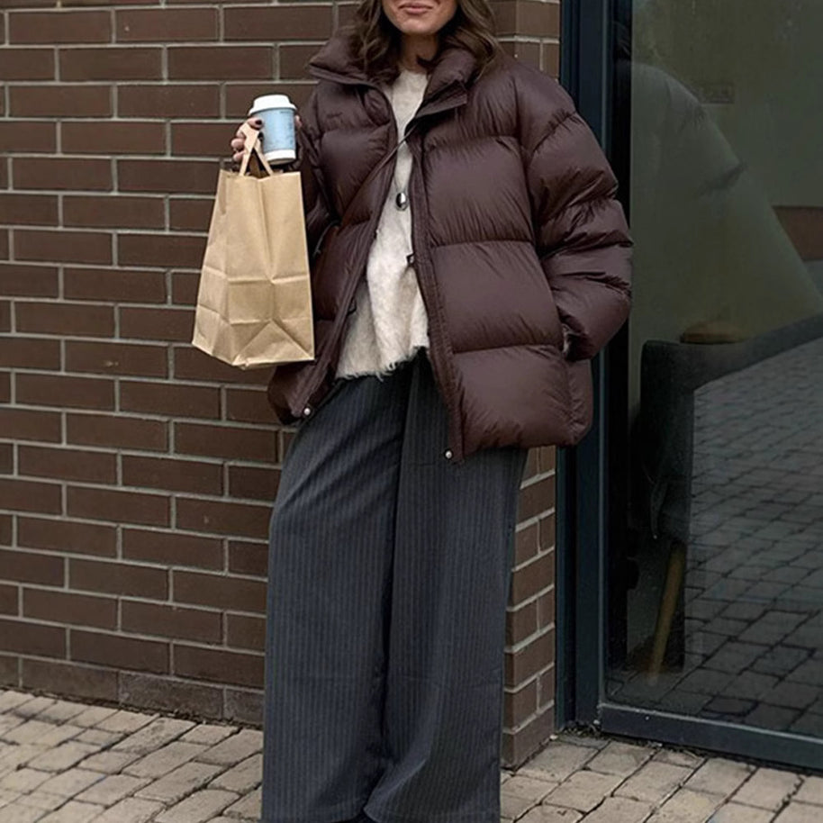 Damen Steppjacke im oversized Schnitt mit hohem Kragen und Taschen WW