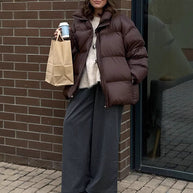 Damen Steppjacke im oversized Schnitt mit hohem Kragen und Taschen WW