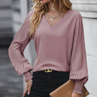 Damen Bluse mit voluminösen Plisseeärmeln und elegantem V-Ausschnitt WW
