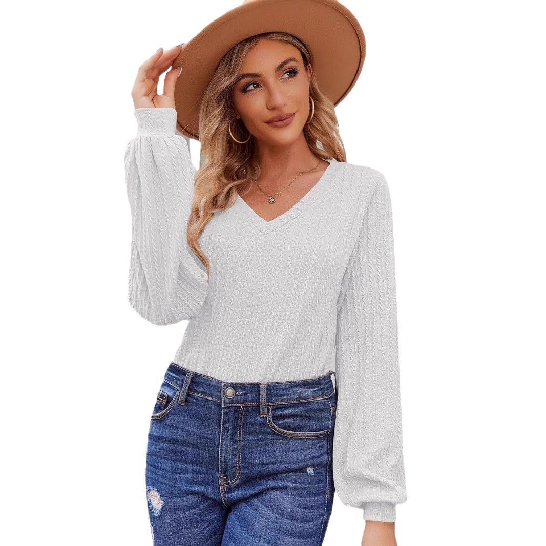 Damen Strickbluse mit feiner Rippstruktur und lässigem V-Ausschnitt WW