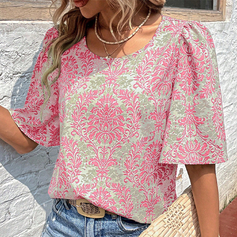Damen Bluse mit volumetrischen Ärmeln und floralen Mustern WW