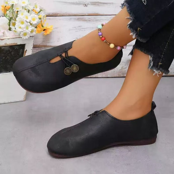 Damen Komfortable und stilvolle Slipper mit dekorativen Schnürdetails W&W Mode