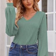 Damen Strickbluse mit feiner Rippstruktur und lässigem V-Ausschnitt WW