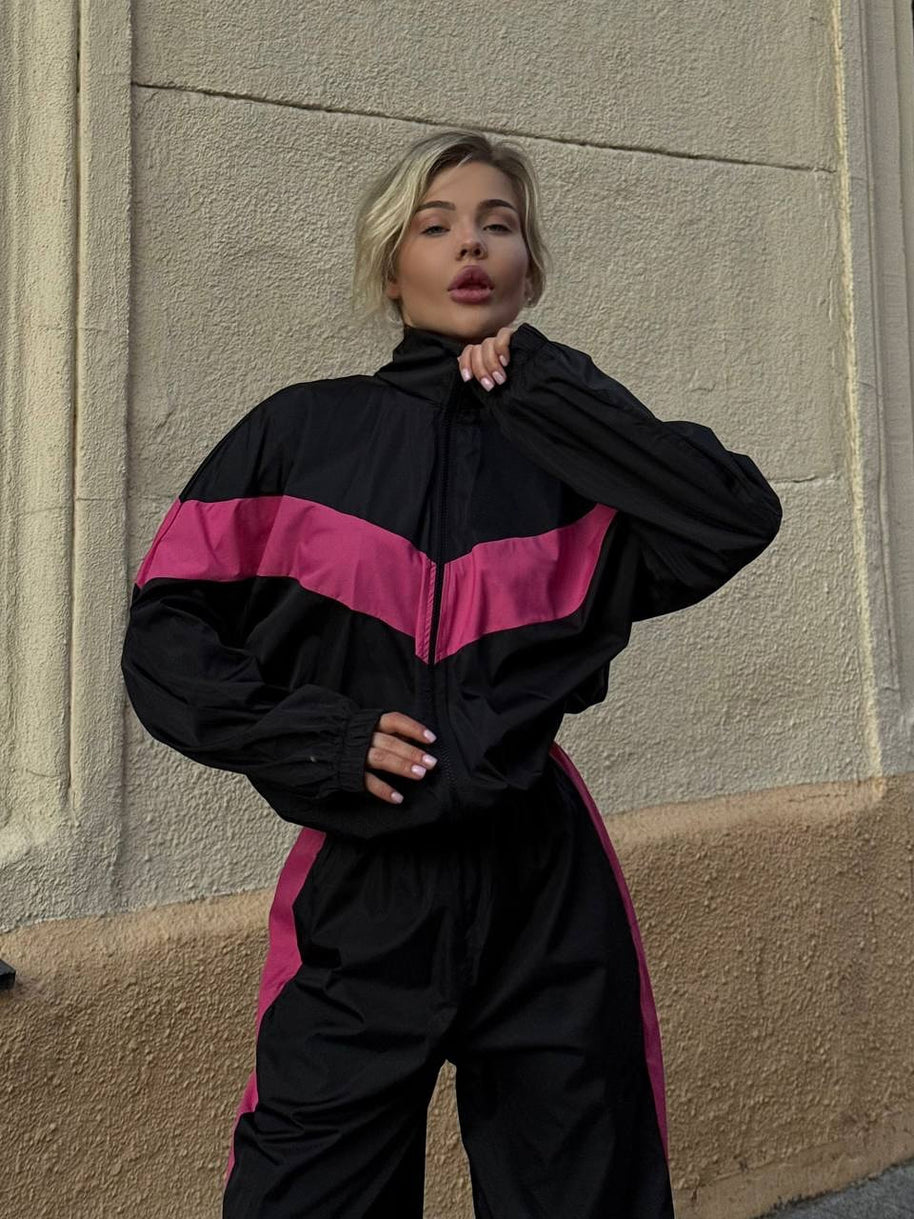 Damen sportlicher Funktionsanzug mit hohem Kragen und elastischen Bündchen WW