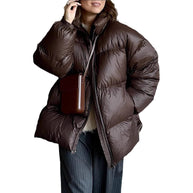 Damen Steppjacke im oversized Schnitt mit hohem Kragen und Taschen WW