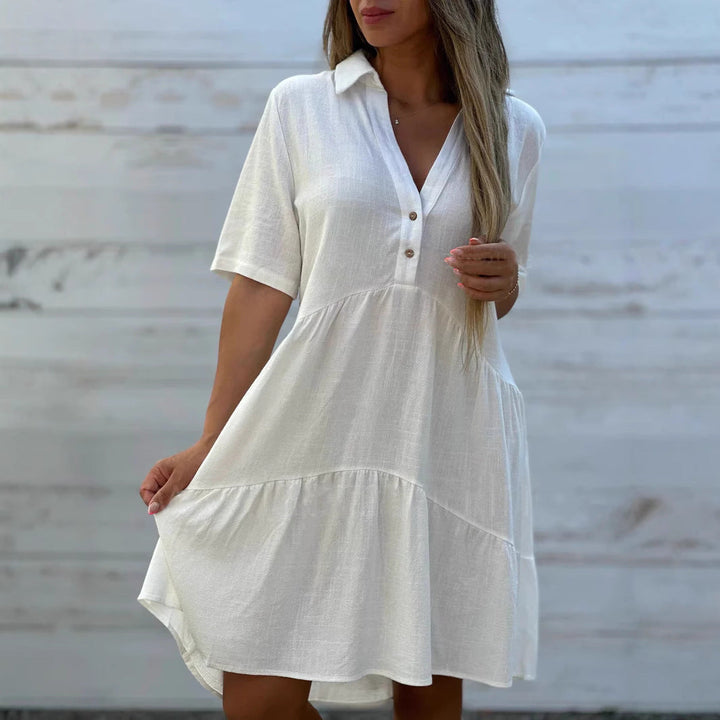 Damen lockeres Hemdkleid mit Knopfdetails und fließendem Saum W&W Mode