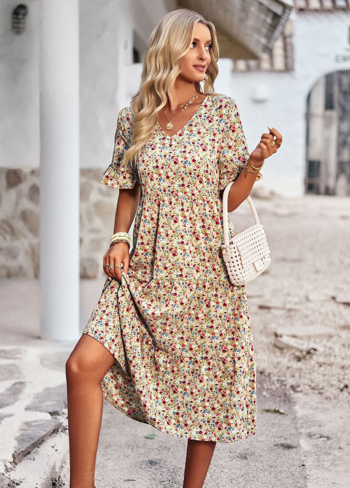 Damen Midi-Kleid mit floralem Muster und verspieltem V-Ausschnitt W&W Mode
