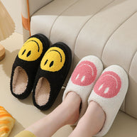 Schwarzes mit gelbem Smiley-Design und weißes mit rosa Smiley-Design von Pelzpantoffeln