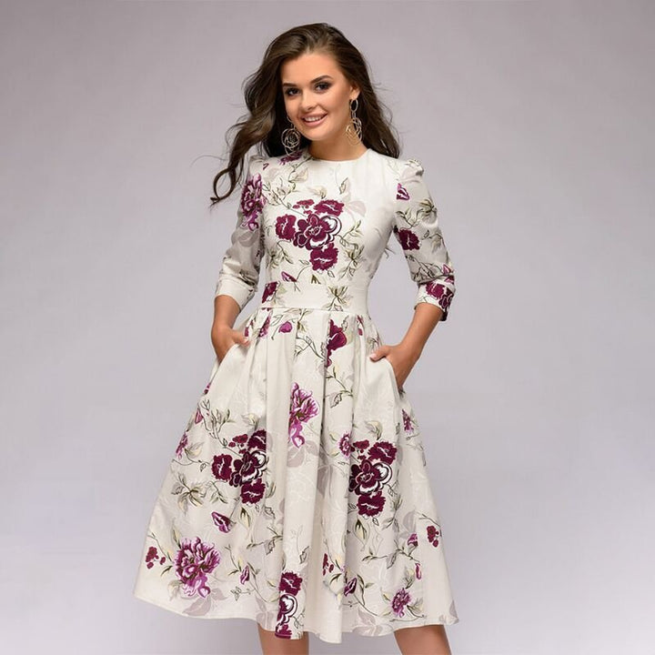 W&W Mode | Lässiges Mittellanges Kleid mit Rundhalsausschnitt Blumendruck und Taschen
