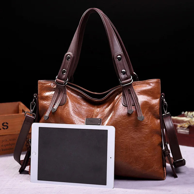 WW | Taschen aus Geschmeidigem Leder mit Zwei Riemen und Eleganten Details