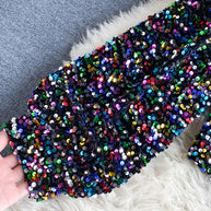WW | Glitzerndes Top mit einem Schulterträger