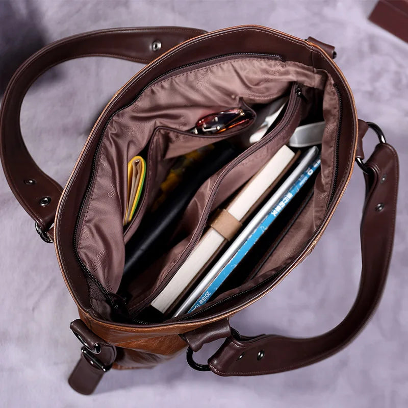 WW | Taschen aus Geschmeidigem Leder mit Zwei Riemen und Eleganten Details