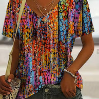 WW | Lebhaftes Retro-T-Shirt mit V-Ausschnitt für Damen