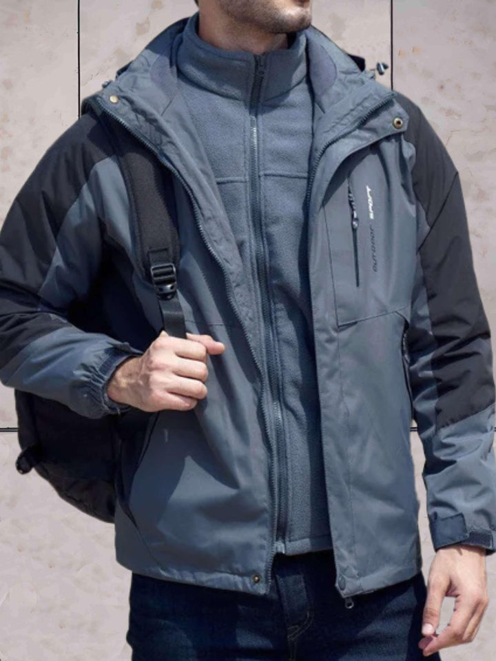W&W Mode | Wind- und wasserdichte Wanderjacke mit Kapuze, Taschen und doppeltem Reißverschluss und Knopfverschluss